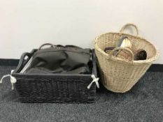 A wicker basket of ladies leather handbags, log basket, wicker tray,