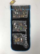 A collection of thirty-two Golly pin badges