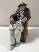 A Royal Doulton figure - Taking Things Easy,
