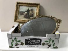 A box containing assorted pictures and prints including a gilt framed oil, cottages with sea beyond,