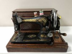 A mahogany cased Singer sewing machine