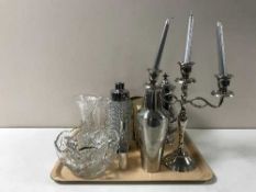 A tray containing assorted glassware, cocktail shakers,