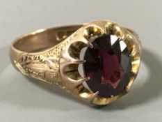 A 9ct gold garnet ring