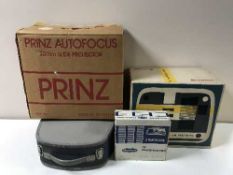 A large quantity of photographic and projector equipment including screens,