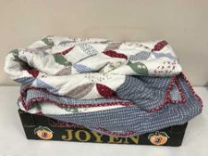Two patchwork bed throws