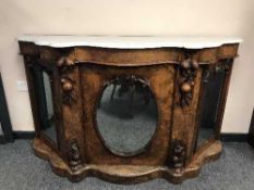 A Victorian walnut and marble topped serpentine fronted credenza