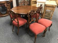 A Victorian mahogany circular dining table and six chairs