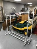 A pair of metal clothes rails