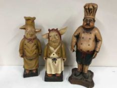 A fibre glass figure of a chef and two of pigs (3)
