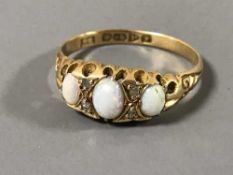 An 18ct gold opal set ring