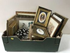 A box containing 20th century framed pictures and prints, wicker basket,