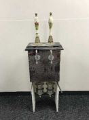 Four Dalex Quadamant beer pumps with porcelain handles depicting hunting scenes on stands