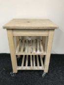 A pine kitchen butcher's block trolley