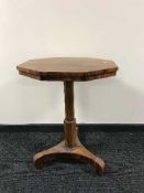 A walnut pedestal occasional table