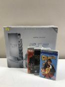 A box of PS2 a large quantity of UMD videos and DVDs