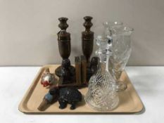A tray containing pair of wooden candlesticks, wooden bookends, wine stoppers,