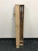 Seven section split cane fly rod in a fitted wooden box with reel