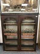 A Victorian mahogany glazed cabinet with painted glazed decoration - R Shaw fresh bread