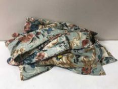 A quantity of floral patterned curtains with tie backs