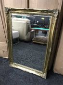 A gilt framed mirror