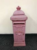 A reproduction cast iron post box