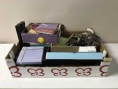 A box containing assorted costume jewellery, jewellery boxes,