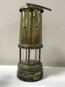 A brass Lamp Limelight miner's lamp together with two miniature Horden Mechanics Lodge Durham