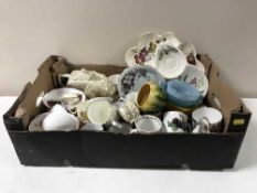 Two boxes containing a quantity of assorted mugs, teapots, tea china,