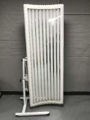 An Elite sun bed canopy on trolley