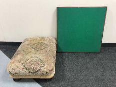 A folding card table and an over sized footstool