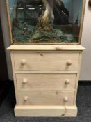 A light pine three drawer chest