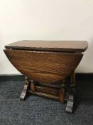 A small oak dropleaf coffee table