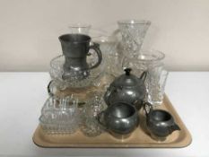 A tray of assorted cut glass and crystal vases, pewter tea service,