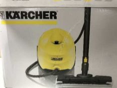A boxed Karcher SC3 steam cleaner