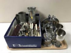 A tray containing 20th century plated ware and table cutlery
