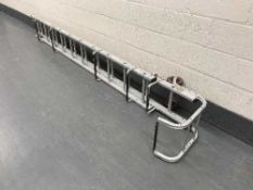 A twin section aluminium roof ladder