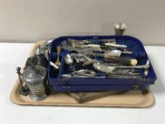 A tray containing plated cutlery, Norwegian pewter lidded pot, metal figure of a puma,