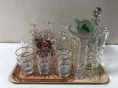 A tray of assorted glassware including liqueur decanters, hand bells, comports,