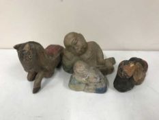 A wood carving of a horse,