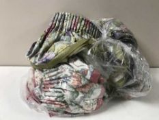 Two boxes containing a large quantity of assorted cushions and curtains