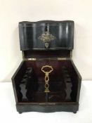 A Victorian ebonised decanter box with brass inlay