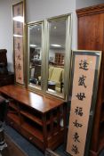 A pair of hall mirrors and a pair of gilt framed prints - Eastern script