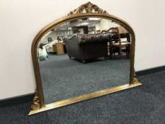 A gilt framed overmantel mirror