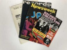 A box of music magazines including Rolling Stone Record Collector