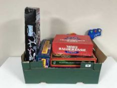 A box of board games,