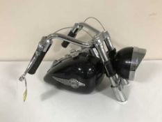 A Harley Davidson novelty radio and a Rhino guitar amplifier