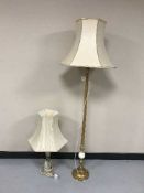 A brass and onyx standard lamp with shade and an onyx table lamp and shade