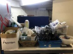 A large quantity of commercial chef's whites, plastic glasses, light bulbs, serviettes, napkins,