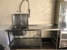 A stainless steel sink unit with extender tap