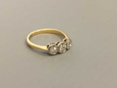 18ct three stone diamond ring approximately .35ct, 2.